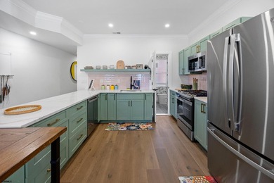 Live the coastal dream and earn from it! This fully renovated - photo 5