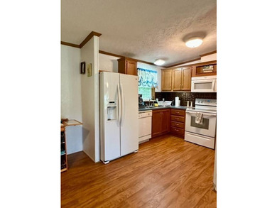 Tucked away in a 1 acre +/- wooded setting, this 3 bedroom - photo 6
