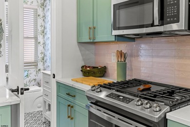 Live the coastal dream and earn from it! This fully renovated - photo 8