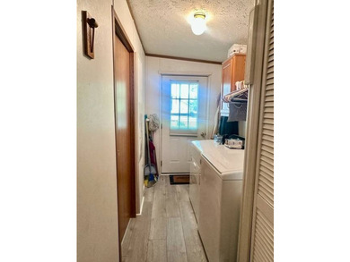 Tucked away in a 1 acre +/- wooded setting, this 3 bedroom - photo 9