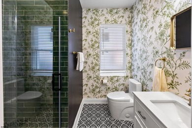 Live the coastal dream and earn from it! This fully renovated - photo 9