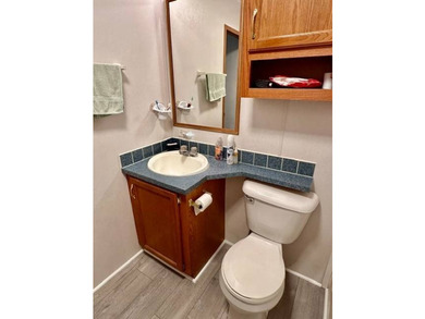 Tucked away in a 1 acre +/- wooded setting, this 3 bedroom - photo 10