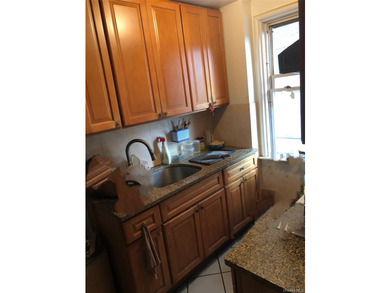 -This property in the sought-after Flushing neighborhood of - photo 3