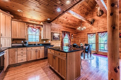Stunning 3 bedroom, 2.5 bath, 2,200 +/- square foot log home - photo 7