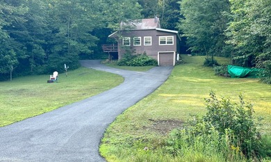 This cozy 4-season cabin is situated directly across the street - photo 42