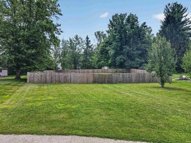 Build your dream home on this nearly half-acre lot tucked away - photo 12