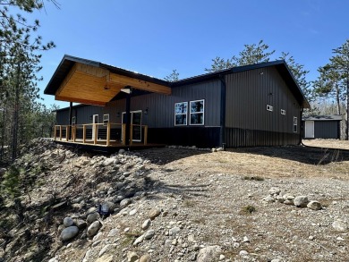 Lake Home For Sale in Millersburg, Michigan