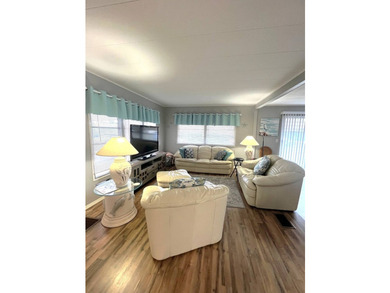 This lovely open-concept home has been beautifully updated with - photo 2