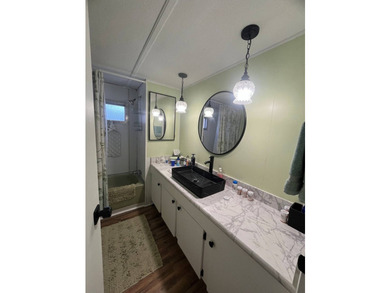 This lovely open-concept home has been beautifully updated with - photo 6
