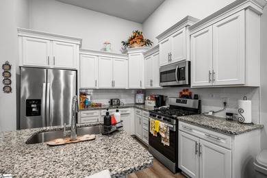 Welcome home to this beautifully designed townhome in the heart - photo 7