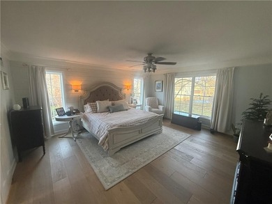 Beautifully updated and filled with natural light, this Leawood