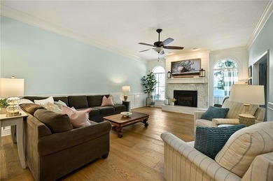 Beautifully updated and filled with natural light, this Leawood