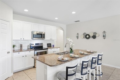 Experience the best of Florida living in the lovely gated - photo 9