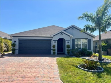 Lake Home For Sale in Lehigh Acres, Florida