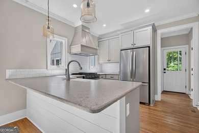 Beautiful inside and out! This home is located in one of the - photo 4