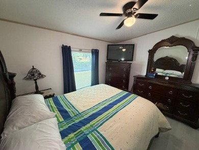 GARAGE, CARPORT & CORNER LOT LIVING IN WHISPERWOOD! Welcome to - photo 6