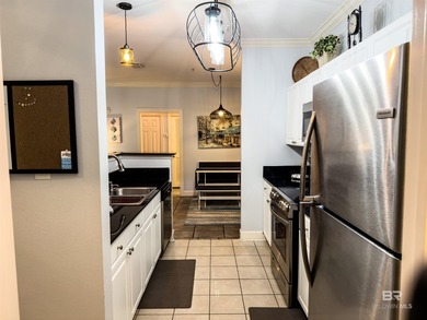 Welcome to this beautifully updated, ground-level condo that - photo 4
