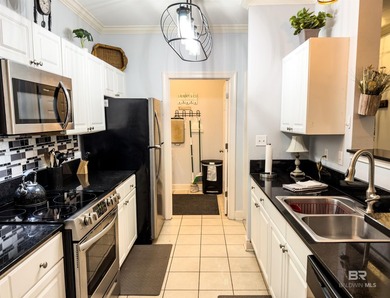 Welcome to this beautifully updated, ground-level condo that - photo 6