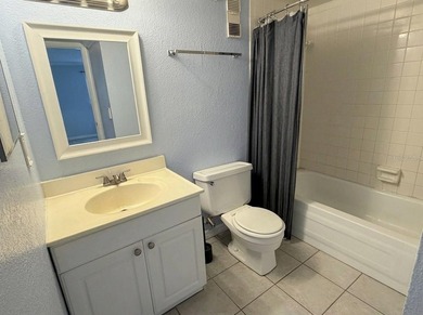 Enjoy serene lakefront living in this beautifully maintained - photo 4