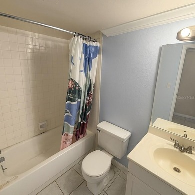 Enjoy serene lakefront living in this beautifully maintained - photo 8