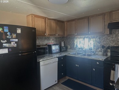 This home nestled in a 55+ park in the Harbor Hills is perfect - photo 5