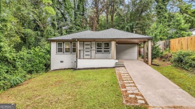 Don't miss this private retreat in the city! 3BR/2BA Mid-Century
