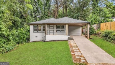 Don't miss this private retreat in the city! 3BR/2BA Mid-Century