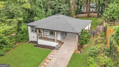 Don't miss this private retreat in the city! 3BR/2BA Mid-Century
