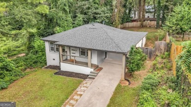 Don't miss this private retreat in the city! 3BR/2BA Mid-Century