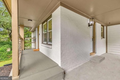 Don't miss this private retreat in the city! 3BR/2BA Mid-Century
