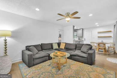 Don't miss this private retreat in the city! 3BR/2BA Mid-Century