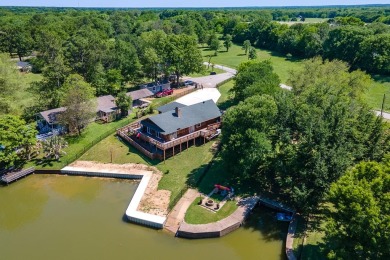 Laze your days away in this lake house on water in a calm - Lake Home For Sale in Tool, Texas