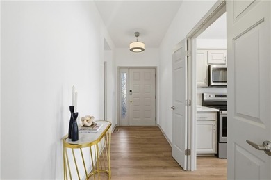 Welcome to this fully remodeled, maintenance-provided villa in