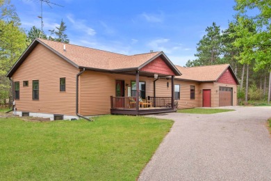 Enjoy the serenity of 3.6 acres of wooded land in this well - Lake Home For Sale in Nekoosa, Wisconsin