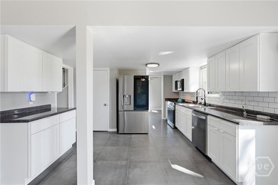Welcome to this beautifully updated 4-bedroom, 2.5-bath home - photo 11