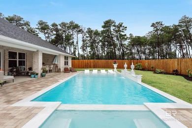Resort-style living starts in the backyard of this beautifully - photo 1