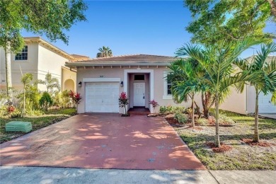 Lake Home For Sale in Coconut Creek, Florida
