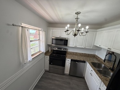 Welcome to this bright two-bedroom, two-bathroom condominium in - photo 12