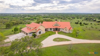 Stunning custom home on gorgeous 35.04 acres (per plat) within