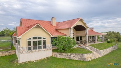 Stunning custom home on gorgeous 35.04 acres (per plat) within