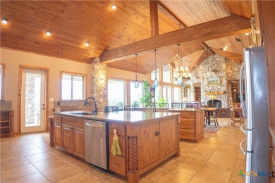 Stunning custom home on gorgeous 35.04 acres (per plat) within