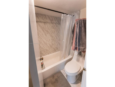 Condominium unit offering 3 bedrooms and 2 bathrooms with garden