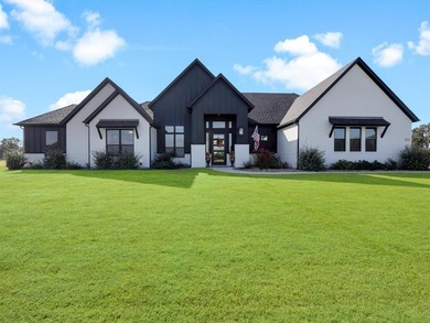 Lake Home For Sale in Poolville, Texas