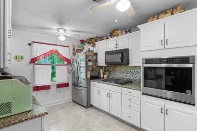 Discover your perfect retreat in this charming 2,058 square foot - photo 14