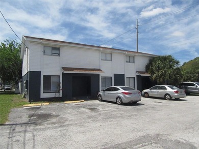 PRICE REDUCTION! Welcome to this charming two-story end-unit - photo 3