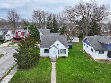 Completely renovated inside and out, this charming cape cod - photo 2
