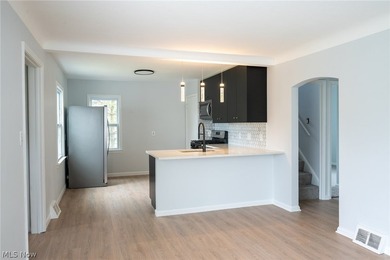 Completely renovated inside and out, this charming cape cod - photo 6