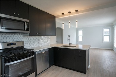 Completely renovated inside and out, this charming cape cod - photo 7