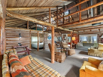 Tucked along 50 feet of coveted West Twin Lake frontage, this - photo 12