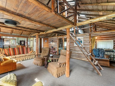 Tucked along 50 feet of coveted West Twin Lake frontage, this - photo 15
